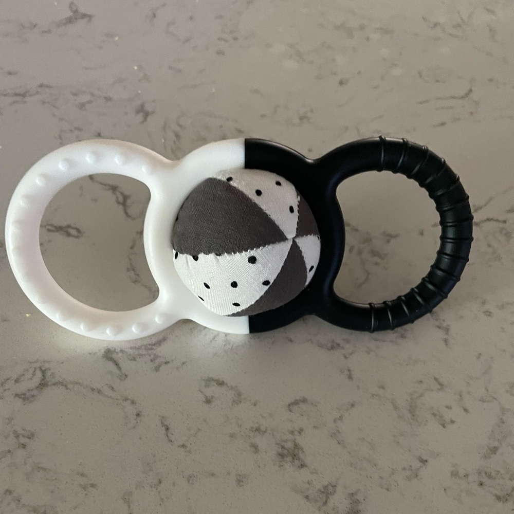 Lovevery silicone rattle with removable ball that jingles
